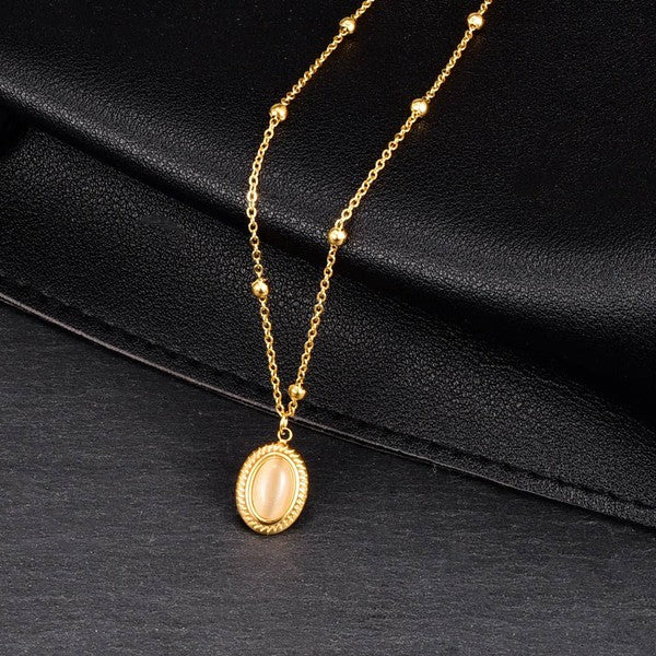 18K GOLD OVAL CAT’S EYE NECKLACE