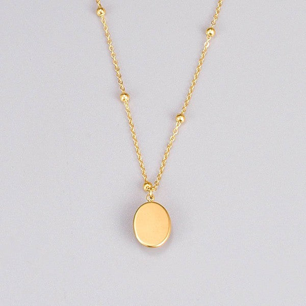18K GOLD OVAL CAT’S EYE NECKLACE